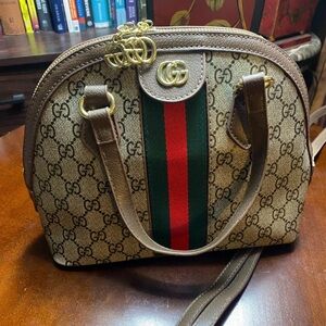 NEW LISTING!!!
Brown and Green Women's Bag